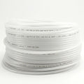 Coiled white hose on a white background