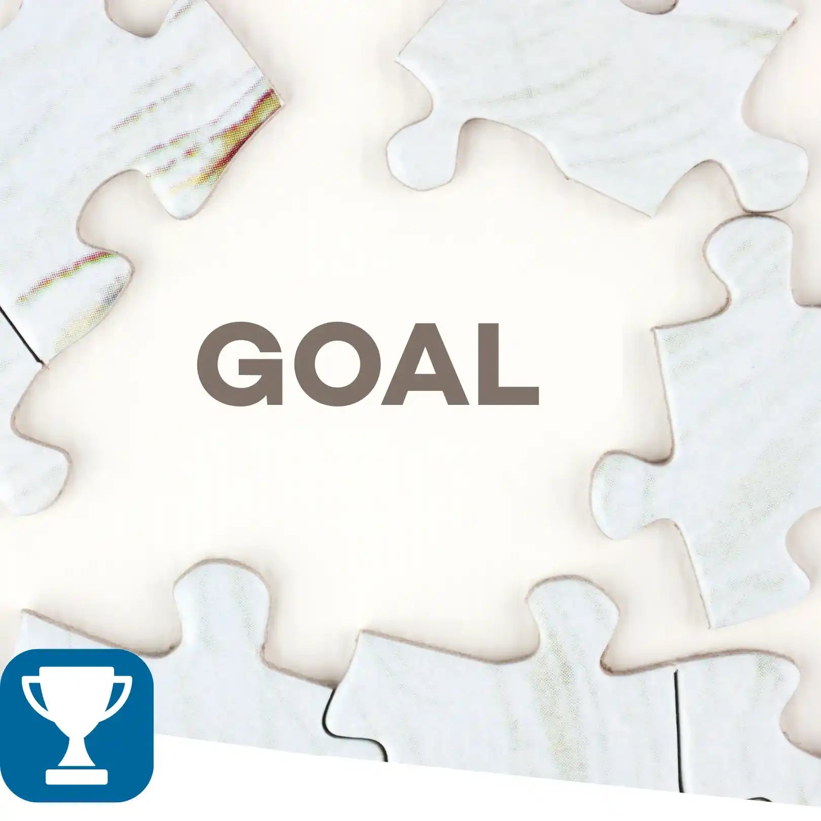 Jigsaw puzzle pieces with the word 'GOAL' and a trophy icon.