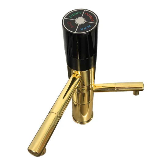 Gold faucet with black handle on a white background